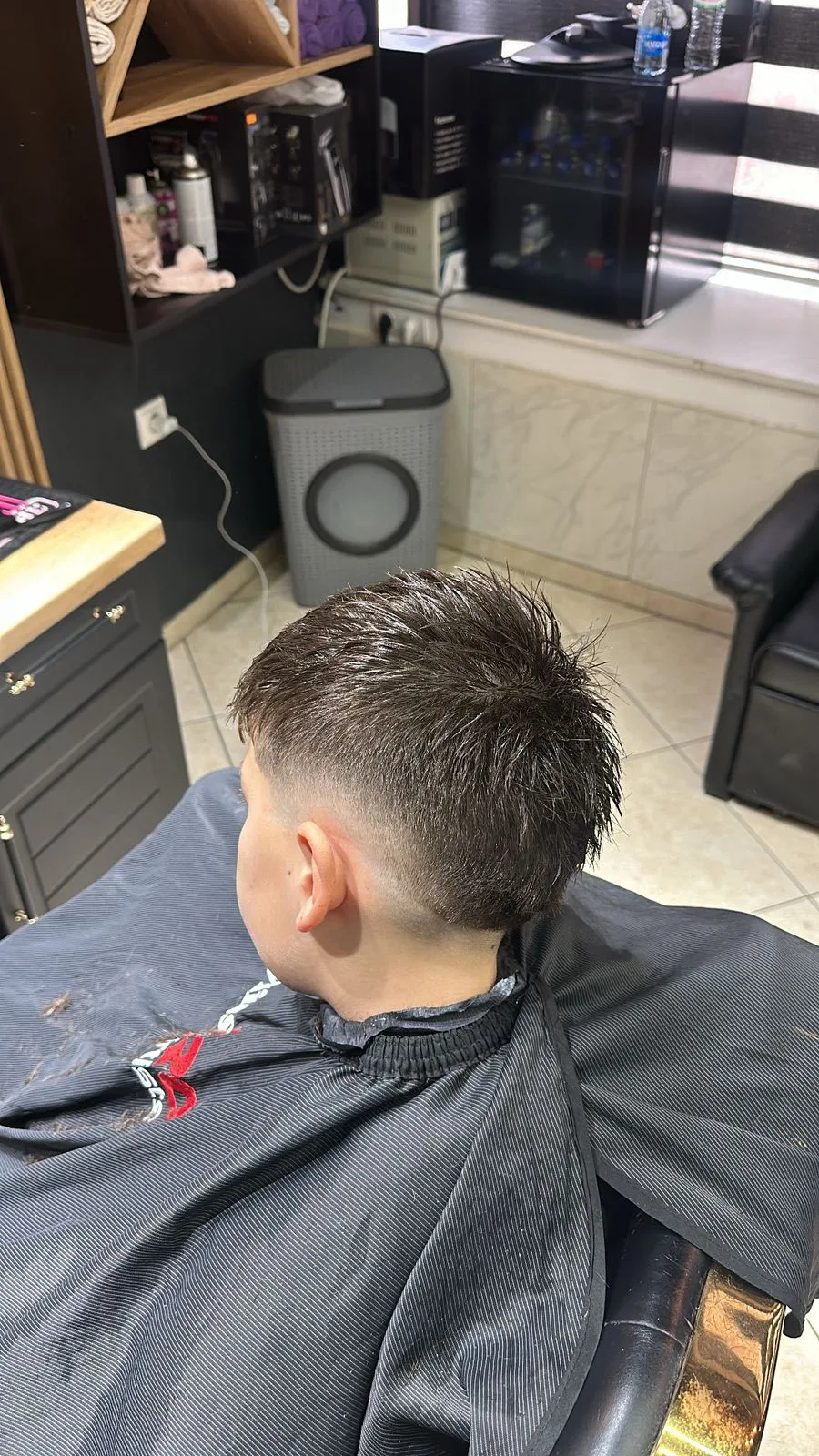 Qethje flokësh në Barbershop LUMI